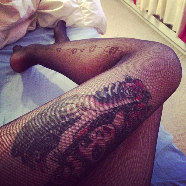 Pantyhose above tattoo